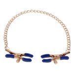 Elegante tepelklemmen met gouden ketting